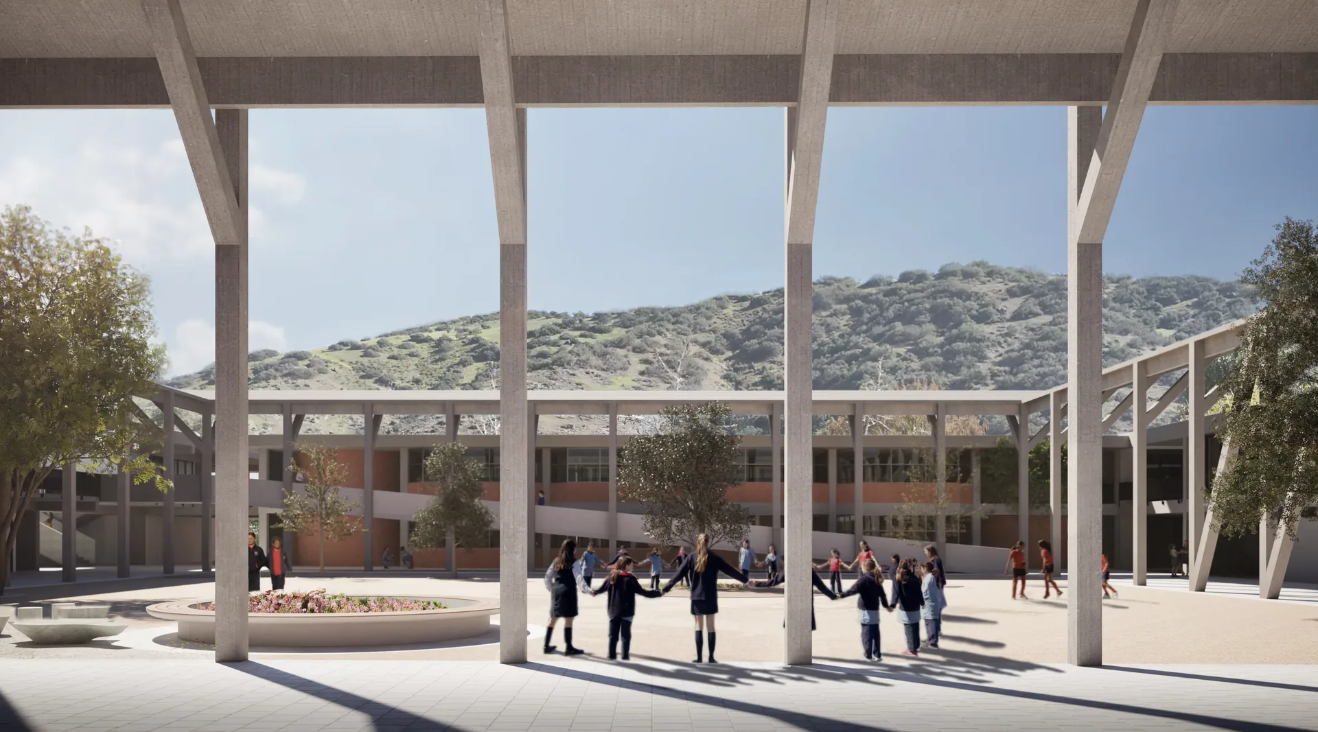 El patio cívico junto a los edificios de aulas.