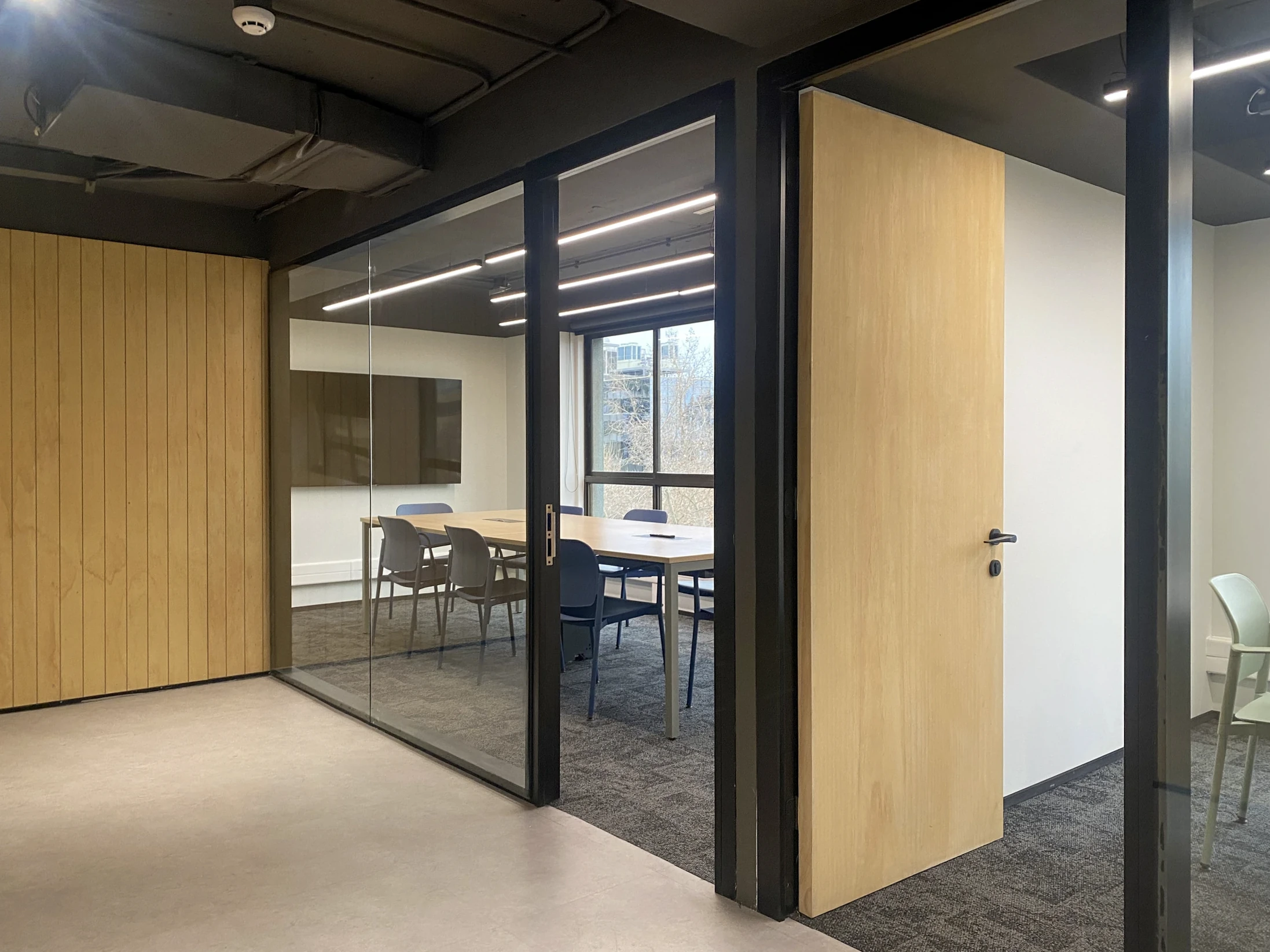 Meeting room and glazed partitions